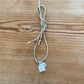 SILVER DEITIES NECKLACE ON SARI CORD