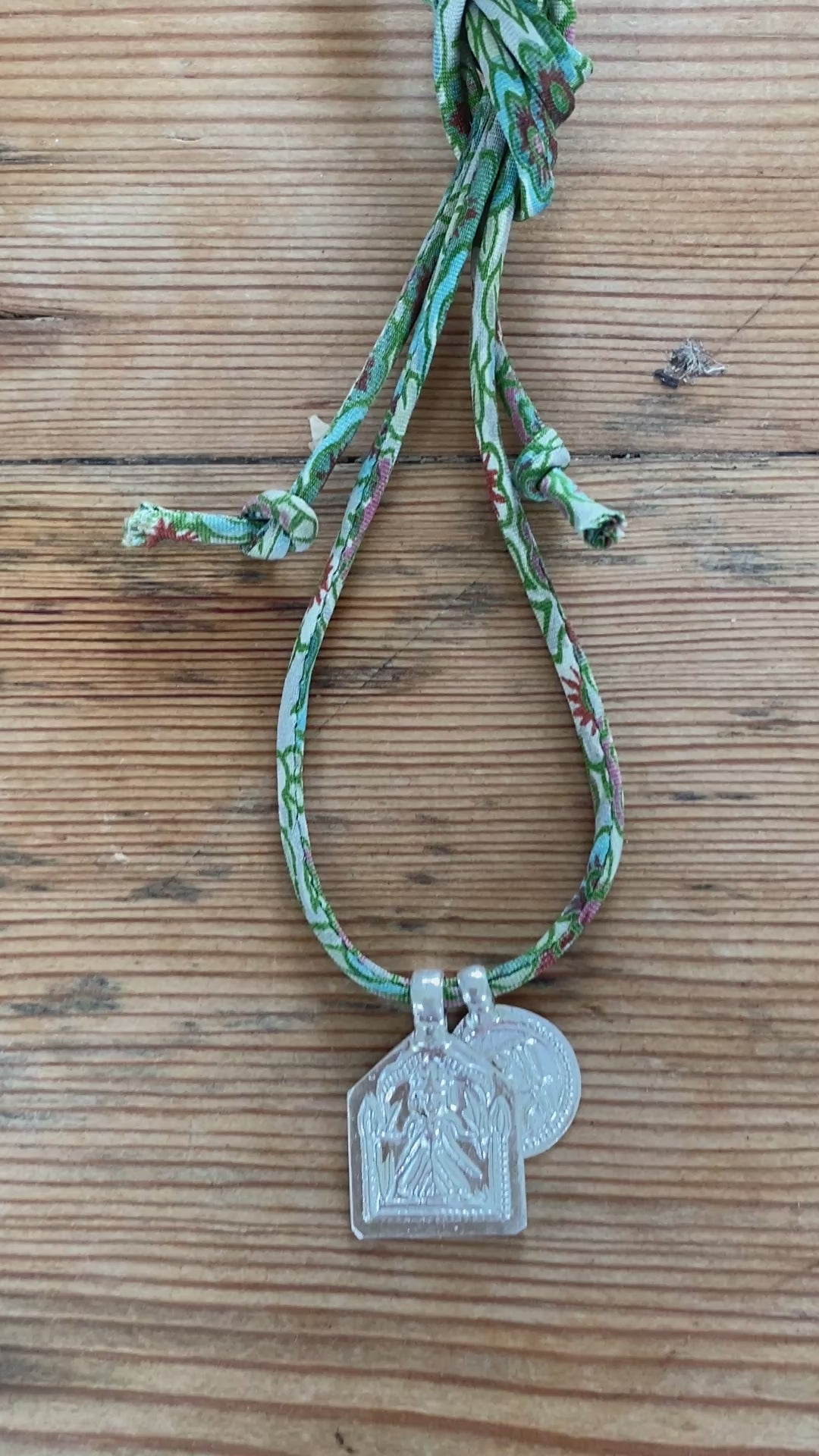 SILVER DEITIES NECKLACE ON SARI CORD